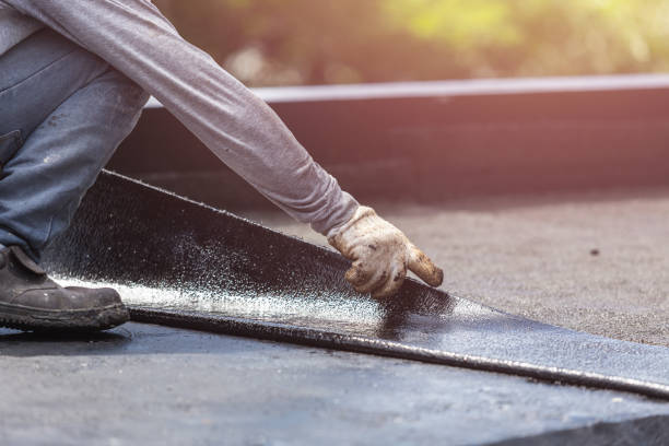 Professional Waterproofing technician working in Lexington, MI